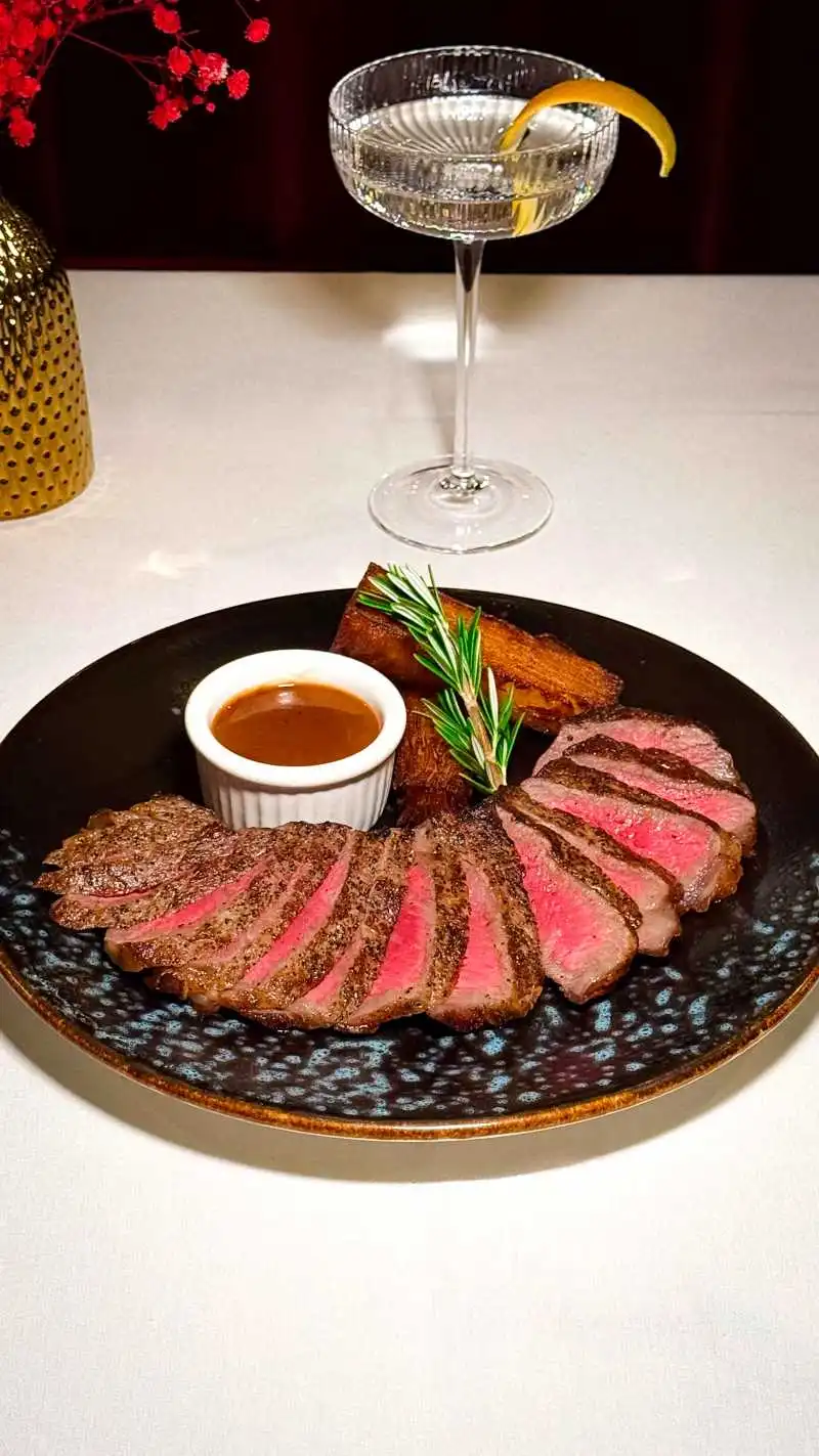Marinated Steak Cooking at ADKT, restaurant in WestHollywood